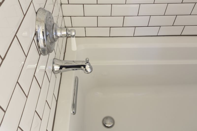 Completed bathroom with a renewed bathtub